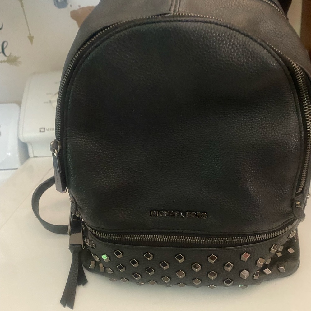 Black Michael Kors studded backpack purse